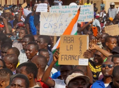 west africa threatens force on niger coup leaders french embassy attacked