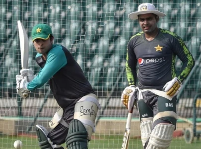 umar akmal in disciplinary crosshairs after ahmed shehzad s mid match exit