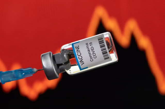 a vial labelled vaccine coronavirus covid 19 is seen in front of a stock graph in this illustration taken on january 17 2022 photo reuters file a vial labelled vaccine coronavirus covid 19 is seen in front of a stock graph in this illustration taken on january 17 2022 photo reuters file