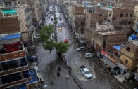 commuters make their way through a flooded street during heavy monsoon rains in hyderabad on july 14 2025 photo afp commuters make their way through a flooded street during heavy monsoon rains in hyderabad on july 14 2025 photo afp