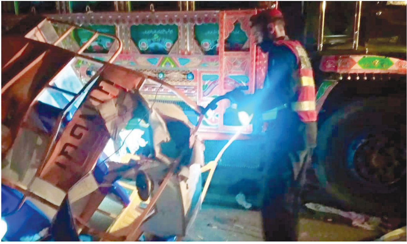 a tragic end a rescue service personnel looks into the squashed vehicle photo online