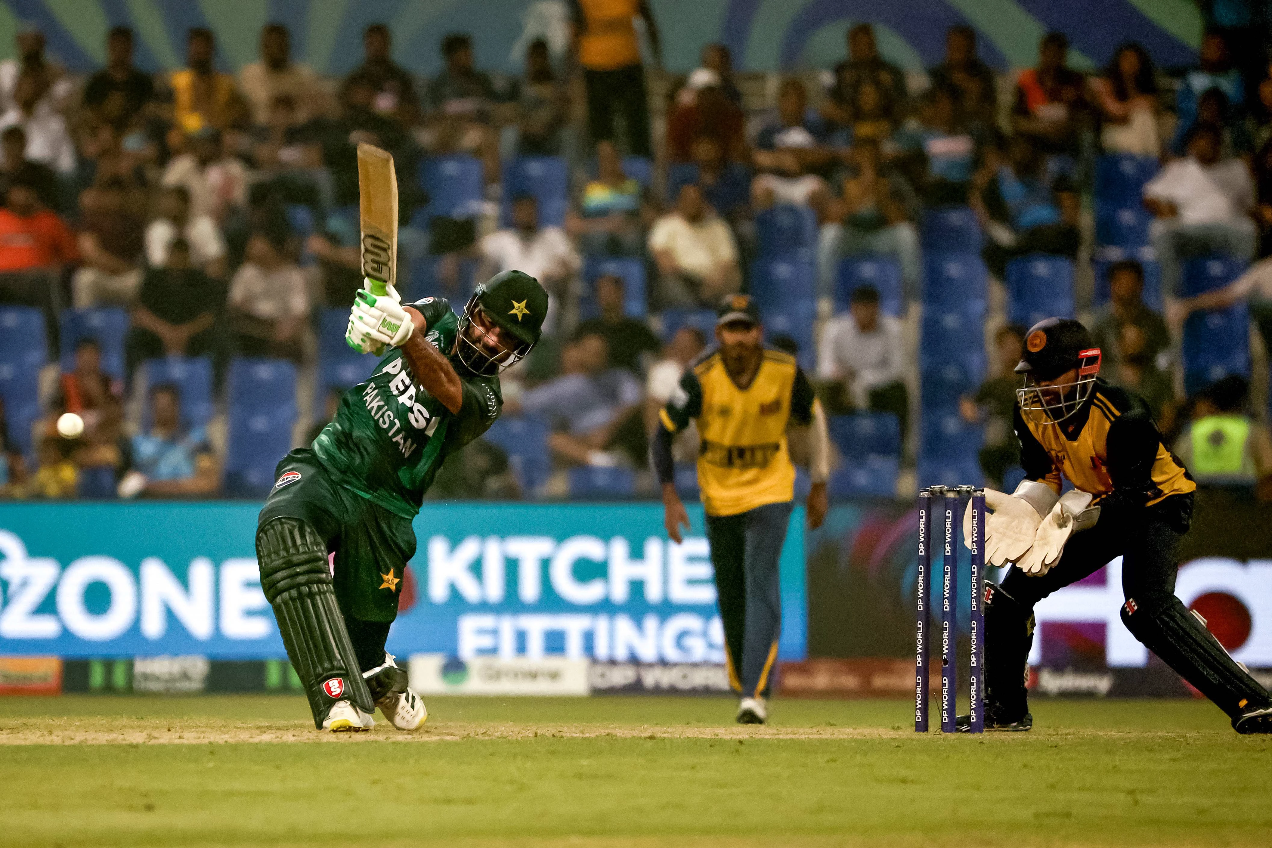 pakistan s hussain talat l plays a shot during the asia cup 2025 super four twenty20 international match against sri lanka at the sheikh zayed cricket stadium in abu dhabi photo afp
