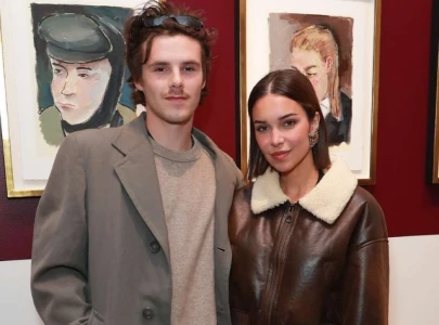 cruz beckham 20 steps out with 30 year old jackie apostel amid family drama