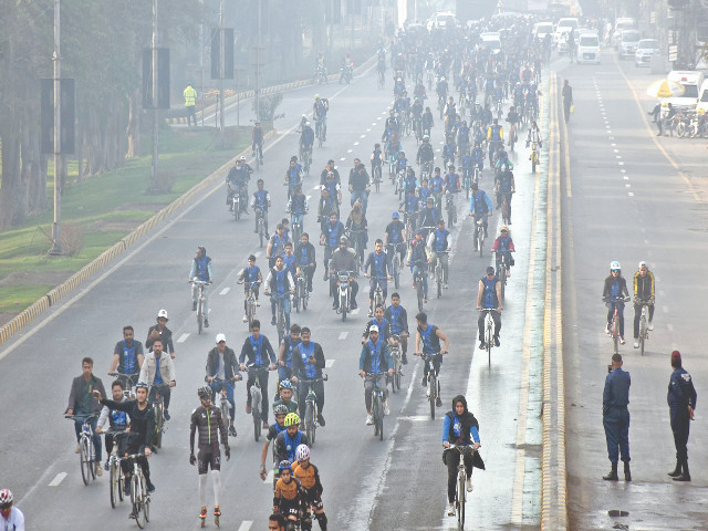 cyclists participate in a race organised in connection with the horse and cattle show in lahore photo online