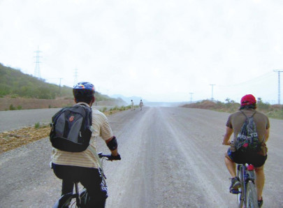 beat reporters arrive in karachi on motorcycle with a message