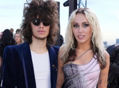 miley cyrus steps out with boyfriend maxx morando for date night after copyright lawsuit