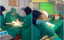 punjab suspends 11 staff members after surgery video goes viral at lahore s lady willingdon hospital