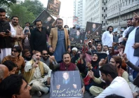 pakistan tehreek e insaf sindh president haleem adil sheikh and other members protest in front of the press club photo jalal qureshi express