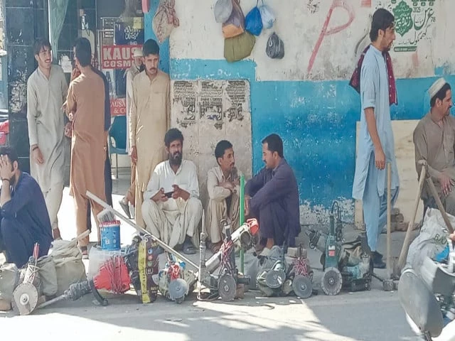 amid the noise of politics and promises daily wage laborers sit quietly with tools in hand by the roadside at bani chowk jamia masjid road in rawalpindi waiting and hoping for a day s work to earn their bread photo express amid the noise of politics and promises daily wage laborers sit quietly with tools in hand by the roadside at bani chowk jamia masjid road in rawalpindi waiting and hoping for a day s work to earn their bread photo express
