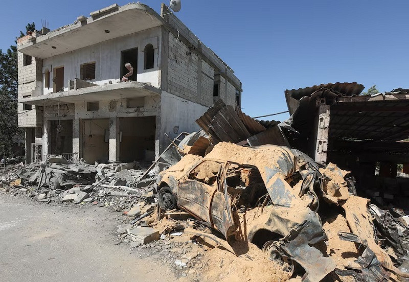 damaged building amid ongoing cross border hostilities between hezbollah and israeli forces in houla village lebanon june 3 2024 photo reuters