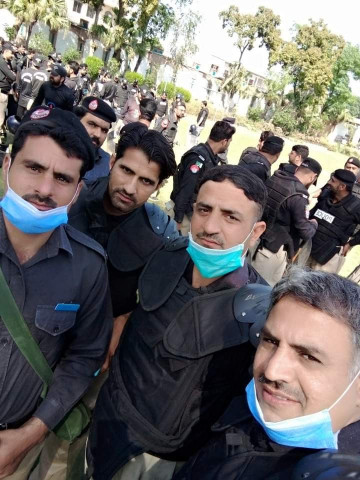 two cops martyred in attack on polio team in mardan