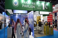 visitors stand outside a stall inside the pakistani pavilion at automechanika dubai 2025 in dubai uae on december 9 2025 photo courtesy pakistani consulate dubai