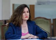 albania s state intelligence chief turned herself in on tuesday after the country s corruption prosecutors issued an arrest warrant