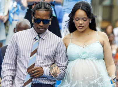 rihanna fans believe a ap rocky revealed gender of third baby during smurfs film premiere