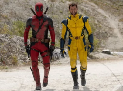 watch deadpool wolverine themed choir perform like a prayer at comic con