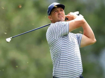 dechambeau storms into masters lead in style