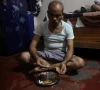 kamta prasad 53 a voter listed as kanta prasad and declared dead in the special intensive revision sir list published on august 1 eats food at his house in new delhi india october 19 2026 photo reuters