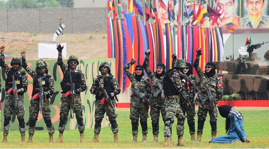 Pakistan Army personnel demonstrating their skills during Defence Day of Pakistan at Karnal Sher Khan (Shaheed) stadium. PHOTO: INP