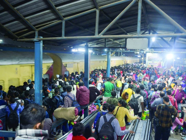 people including hindu pilgrims on their way to attend the kumbh mela gather at the new delhi railway station to board a train photo reuters people including hindu pilgrims on their way to attend the kumbh mela gather at the new delhi railway station to board a train photo reuters