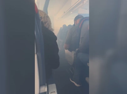 passengers struggle to breathe as delta flight returns to atlanta