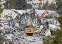 israeli bulldozers demolish a structure inside the headquarters of the unrwa in israeli annexed east jerusalem photo afp