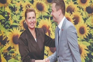 mette frederiksen l and greenland s prime minister jens frederik nielsen photo reuters