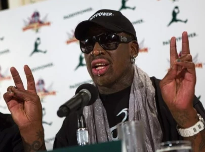 dennis rodman criticizes travis hunter marriage to leanna lenee amid online scrutiny and public debate