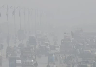 commuters cautiously make their way through a thick blanket of fog on a winter morning as the provincial capital wakes slowly under low visibility turning an ordinary commute into a quiet test of patience and focus photo online