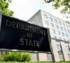 a general view of a us state department sign outside the us state department building in washington dc source reuters