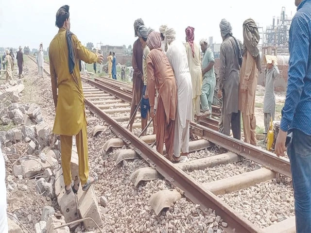 railway workers toil to restore the track near kala shah kaku where the islamabad express derailed a crash that injured dozens and narrowly avoided a worse tragedy rail operations were restored on saturday after safety clearance photo nni railway workers toil to restore the track near kala shah kaku where the islamabad express derailed a crash that injured dozens and narrowly avoided a worse tragedy rail operations were restored on saturday after safety clearance photo nni