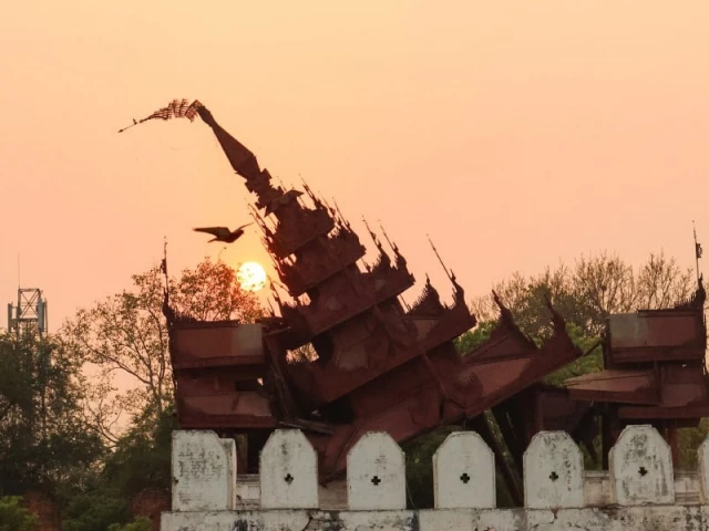a bird flies past the damaged mandalay palace during sunset in mandalay on march 31 three days after the deadly myanmar earthquake photo afp a bird flies past the damaged mandalay palace during sunset in mandalay on march 31 three days after the deadly myanmar earthquake photo afp
