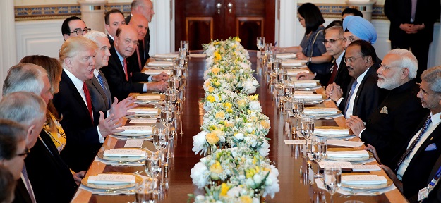  U.S. President Donald Trump and first lady Melania Trump welcome Indian Prime Minister Narendra Modi (R) for a dinner at the White House in Washington, US. PHOTO: REUTERS