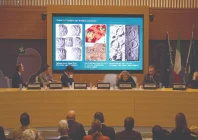 paleontologist cristiano dal sasso of the natural history museum of milan comments on photos during a press conference presenting the discovery of thousands of dinosaur tracks in italy s stelvio national park photo afp