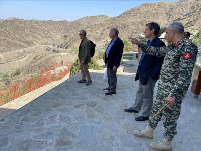 us envoy visits k p distributes aid to flood victims