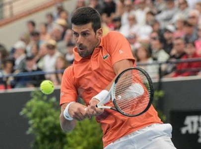 djokovic recovers to reach quarters