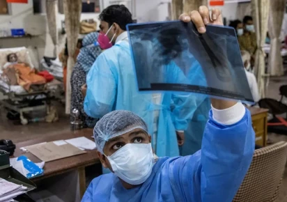 a doctor looks at an x ray at a hospital in this file photo reuters