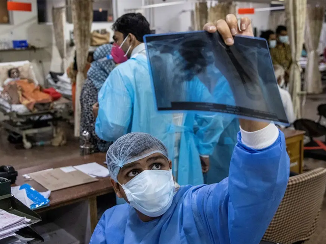 a doctor looks at an x ray at a hospital in new delhi india in this file photo reuters