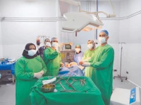 the lead surgeon shows the stake removed from a patient s chest after an arduous operation at jpmc on tuesday photo express