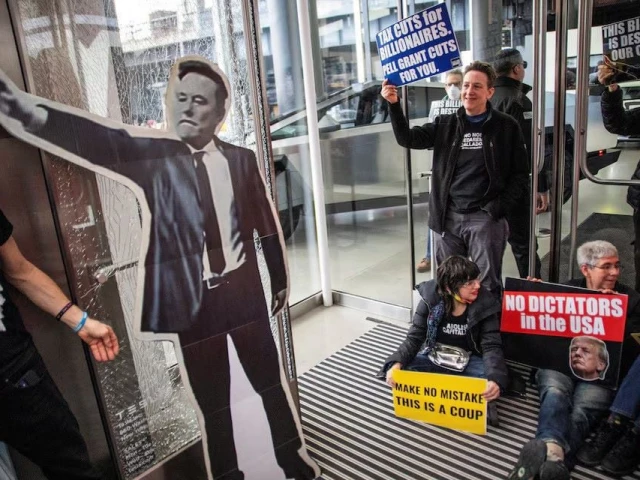people protest inside a tesla store during a national day of tesla protest in new york city u s march 1 2025 photo reuters people protest inside a tesla store during a national day of tesla protest in new york city u s march 1 2025 photo reuters