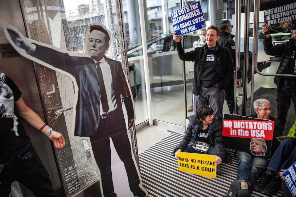 people protest inside a tesla store during a national day of tesla protest in new york city u s march 1 2025 photo reuters