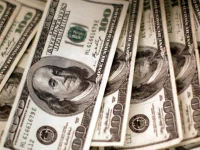 a picture showing 100 bills source reuters