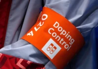 a doping control official attends the women s semifinal ice hockey game played between canada and russia on feb 19 2018 at the 2018 winter olympics in gangneung south korea photo reuters