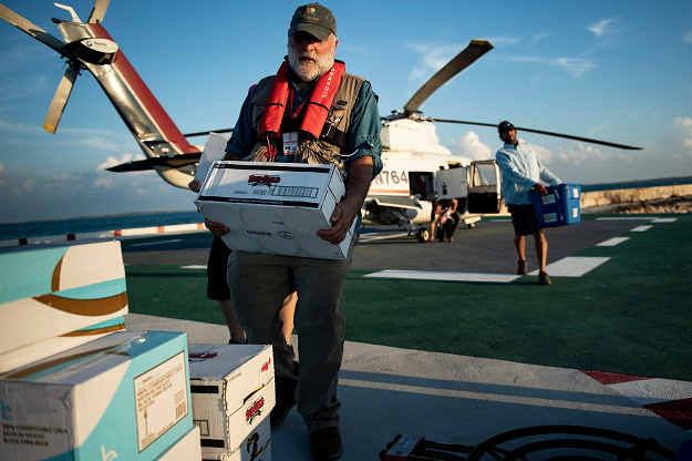 Chef Jose Andres carries food relief while working with his charity group World Central Kitchen to help survivors of Hurricane Dorian September 5, 2019, in Marsh Harbor, Great Abaco, Bahamas. PHOTO: AFP