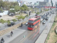 karachi rolls out its first double decker buses featuring 120 seats a top deck with an openable roof for pleasant weather rides and fully air conditioned interiors for hot days photo jalal qureshi express