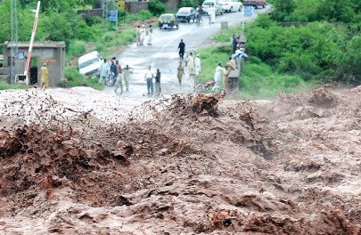 heavy downpour kills four heavy downpour kills four