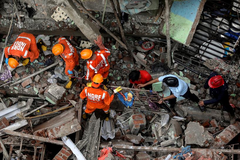 teams of police city workers and members of the national disaster response force removed debris in the cramped lanes of the neighbourhood reuters