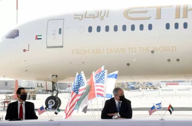 israeli prime minister benjamin netanyahu u s treasury secretary steve mnuchin and uae minister of state for financial affairs obaid humaid al tayer are pictured at ben gurion airport near tel aviv israel october 20 2020 wam handout via reuters