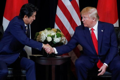 japan s abe tells trump strengthening of alliance will not change