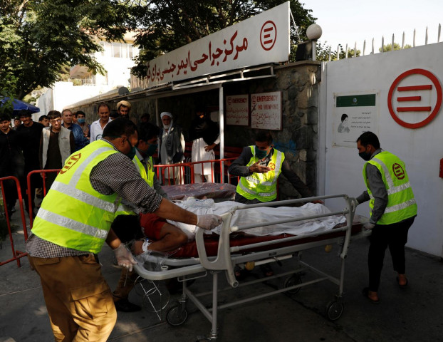 afghan men carry an injured to a hospital after a blast in kabul afghanistan september 9 2020 reuters