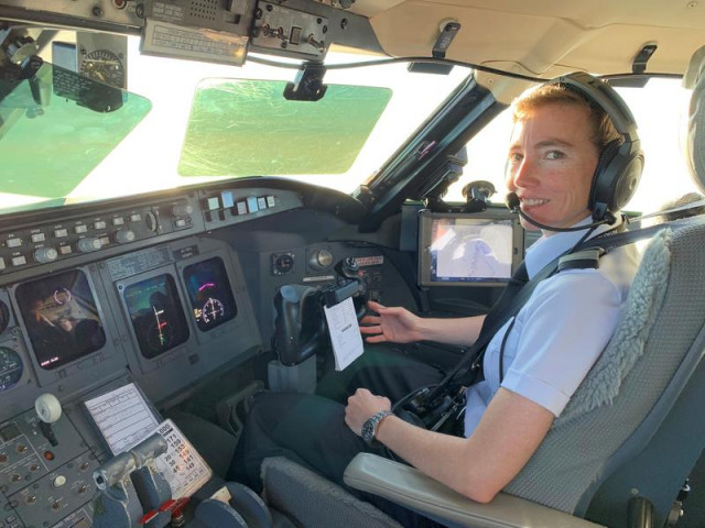 psa pilot megyn thompson in the cockpit of a bombardier crj jet near washington u s september 26 2019 courtesy of megyn thompson handout via reuters